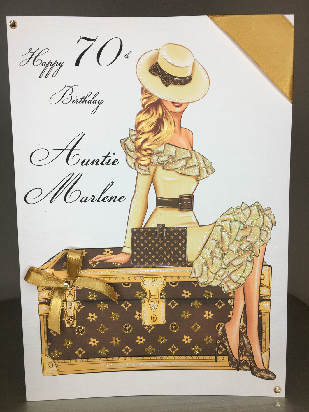 Lady in Cream on Luggage with Blonde Hair